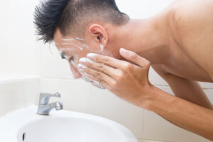 a man washing his face
