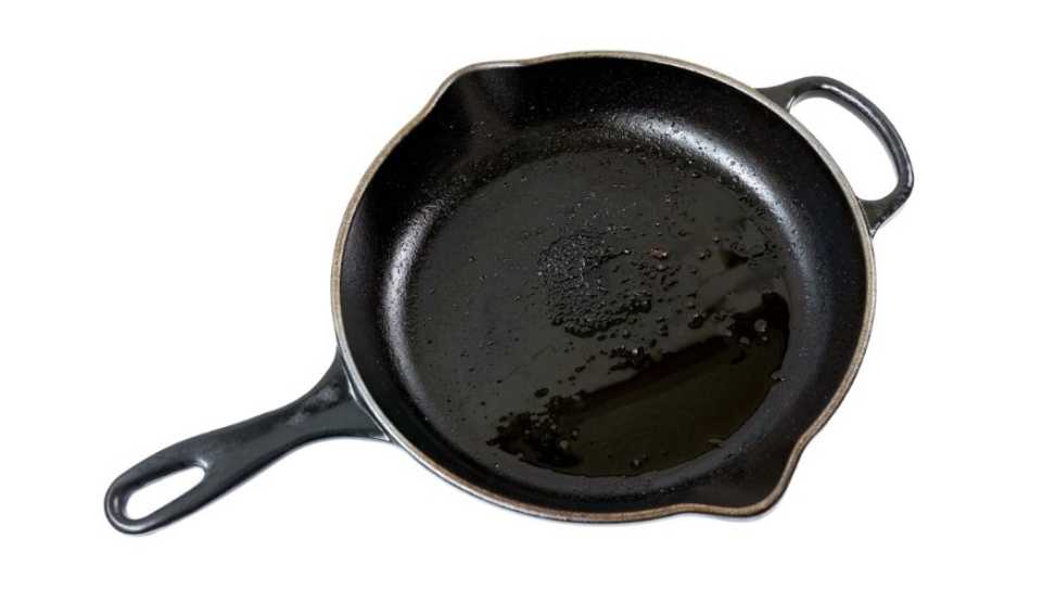cast iron pan burnt skillet surface cover with oil prepare to clean