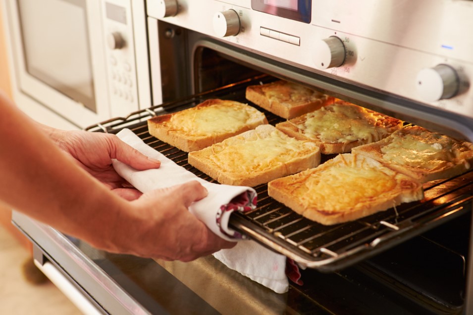 toasting bread inside an oven with a broiler