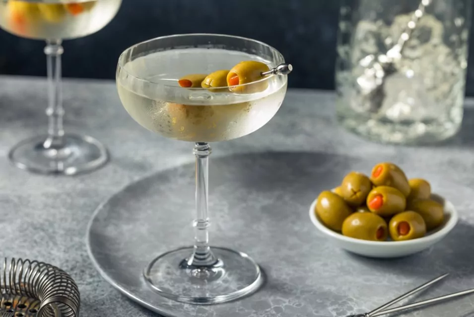 a glass of gin martini