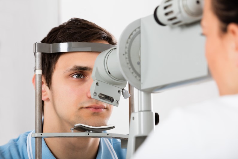 a man doing regular eye check up