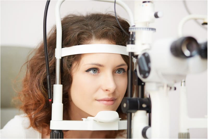 a woman having regular eye check up