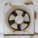 exhaust kitchen ventilator with dirty dust closeup