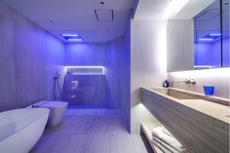 bathroom with purple coloured ambient lighting