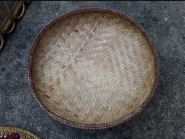 handcrafted round wicker baskets or trays in village house of sikkim