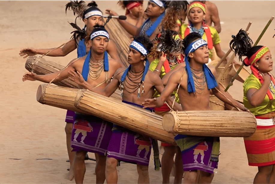 young naga tribesmen playing their traditional musical instruments