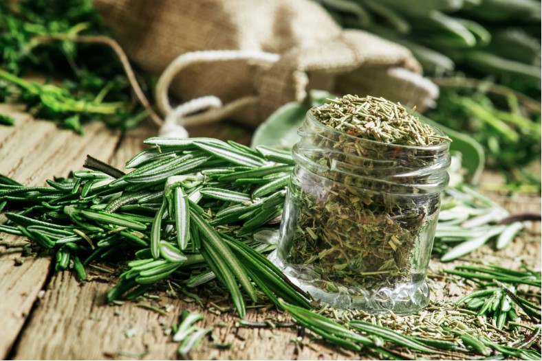 dried rosemary in a glass jar