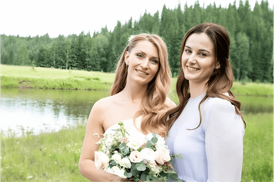 portrait of beautiful bride and best friend on wedding day