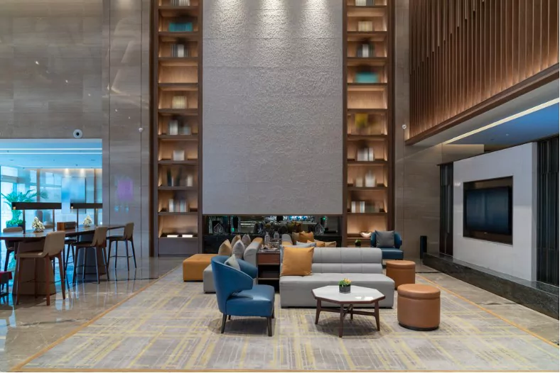 part of hotel lobby interior with modern style furniture