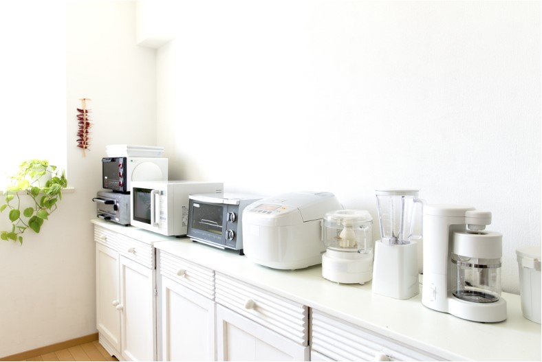 kitchen with small cooking appliances lined up
