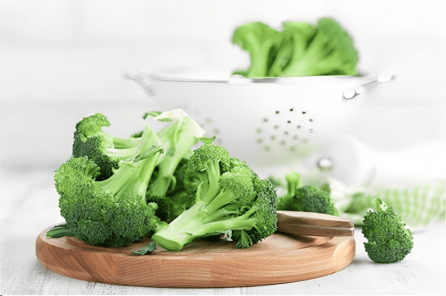 fresh broccoli on white background closeup