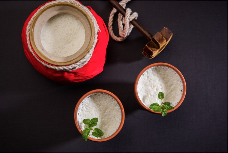 sweet lassi made up of curd and milk and sugar