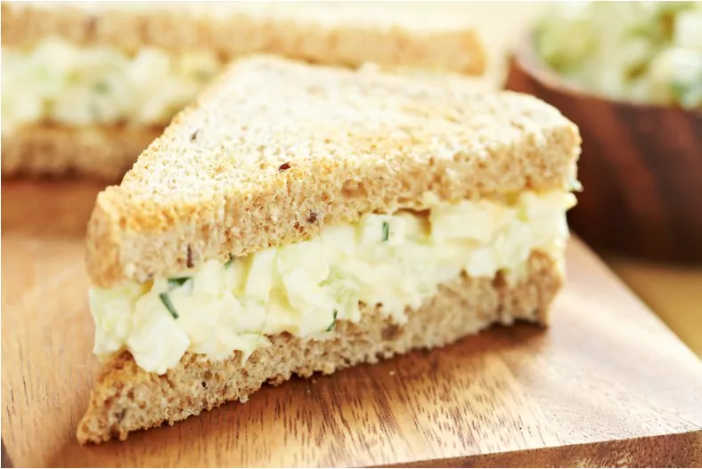 egg salad sandwich with cucumber chive and cream cheese