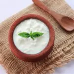 curd in clay pot made from cow milk sour cream or natural cottage cheese