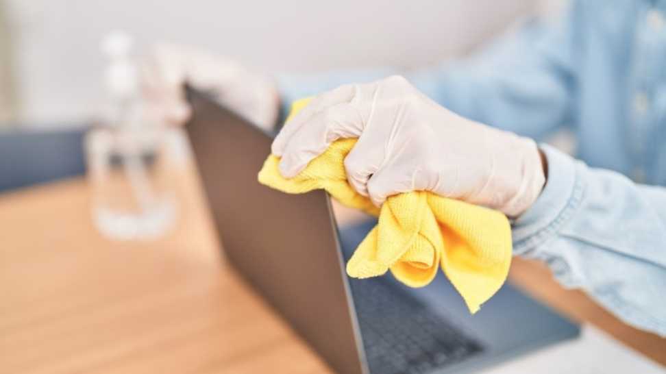 a professional cleaning laptop screen