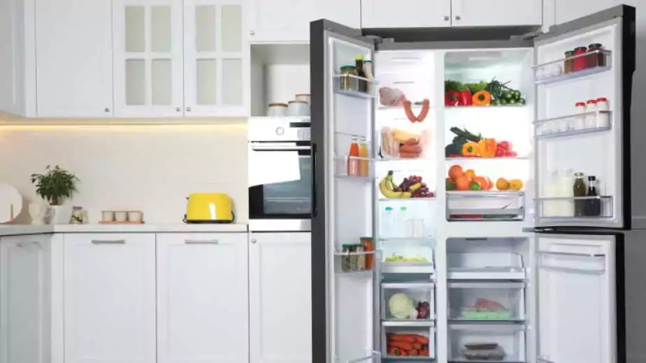 open refrigerator filled with food indoors