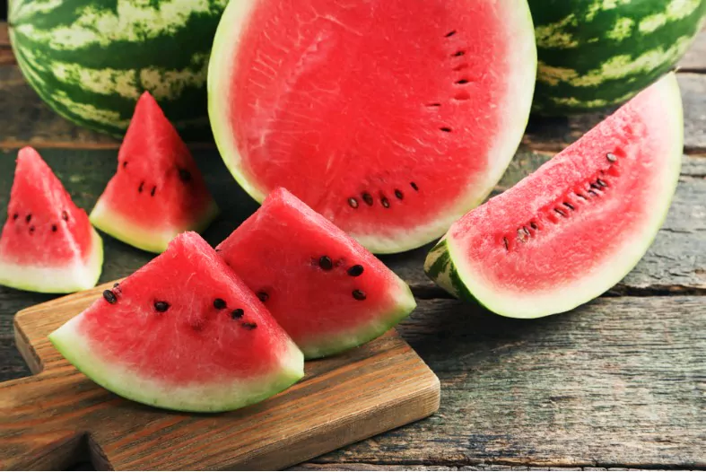 slices of watermelons on a cutting board
