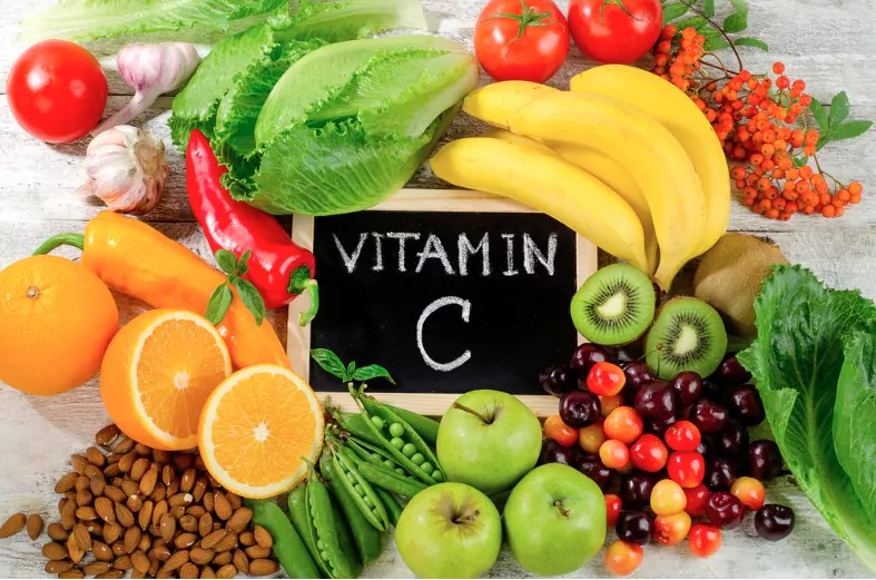 foods high in vitamin c on a wooden board