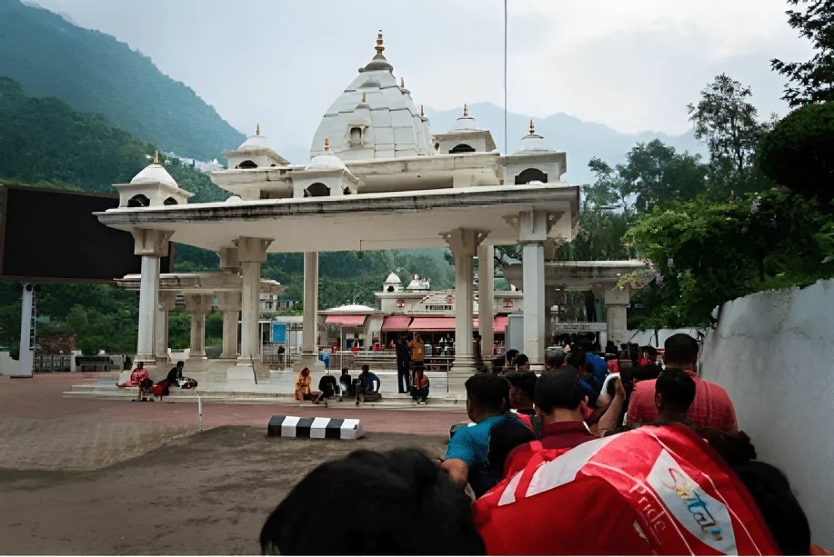 people in queue at the entry gate check point at mata vaishno devi temple