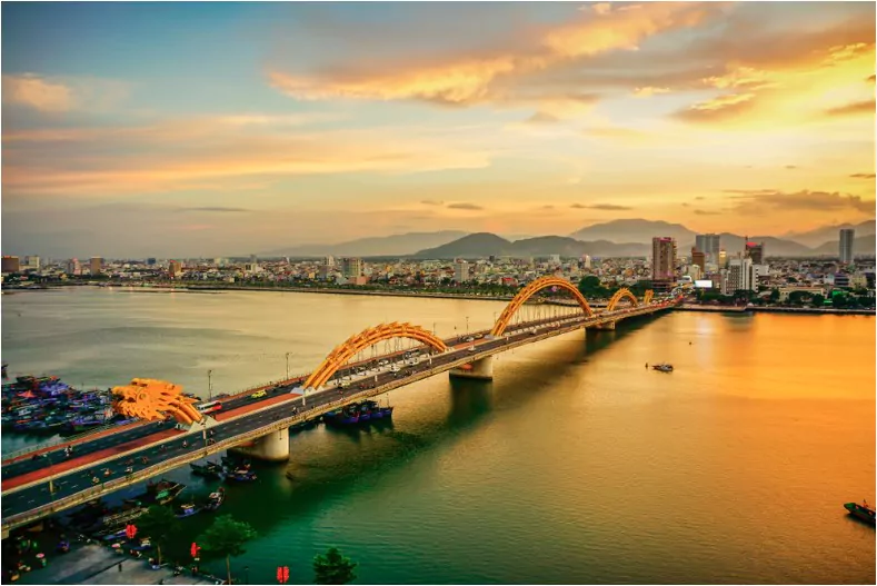 da nang vietnam dragon bridge at sunset