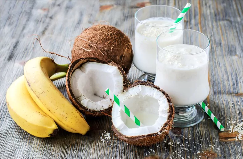 fresh sweet healthy coconut milk shake with bananas
