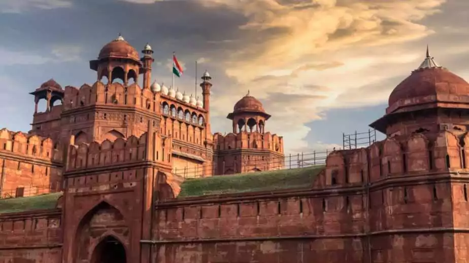 red fort delhi at sunset with moody sky