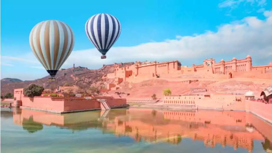hot air balloon flying over amer fort jaipur