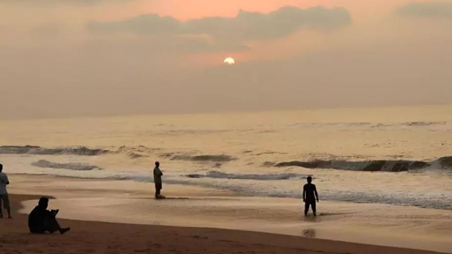 sunset view at puri swargadwar beach